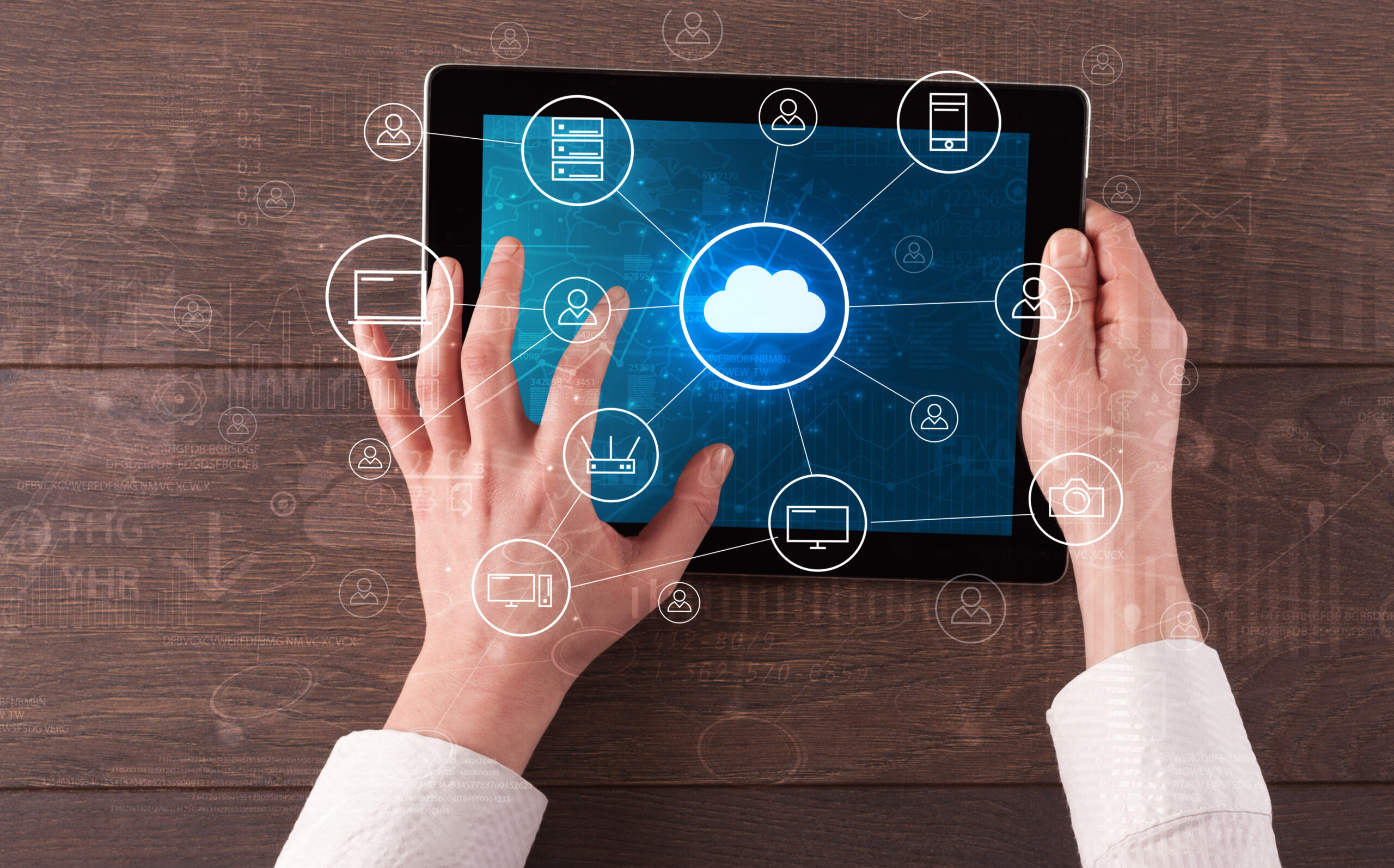 tablet computer with several icons above it.